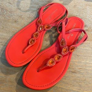Size 9 sandal fuchsia in color.